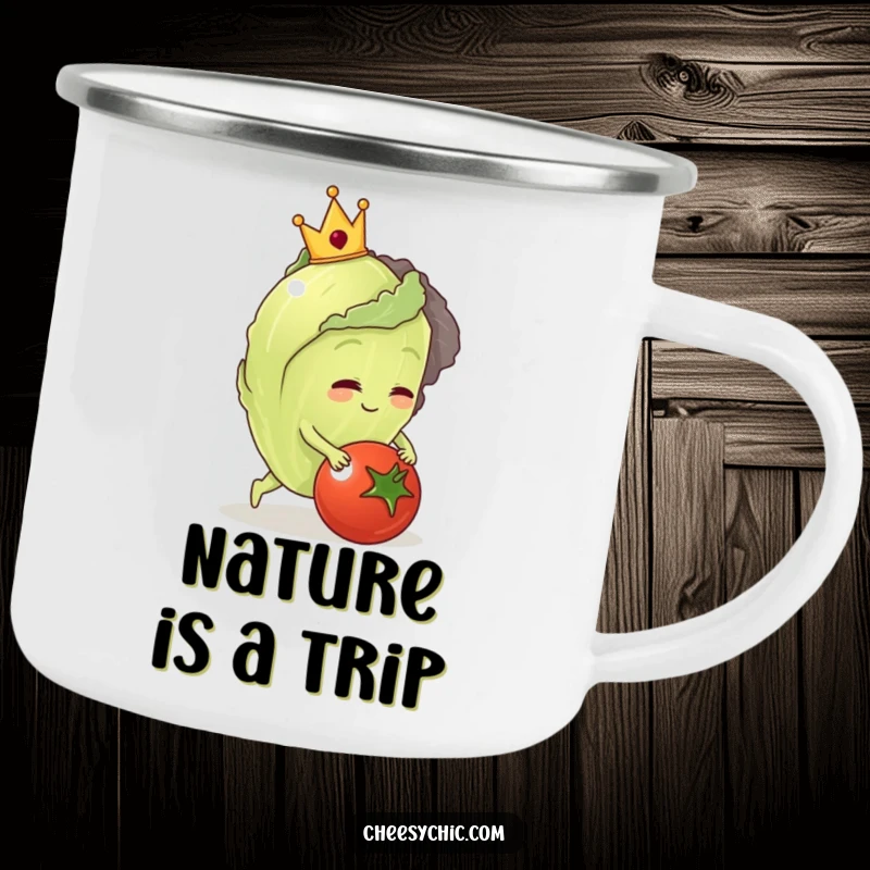 Funny camping mug with an anthropomorphic lettuce wearing a crown, tripping over a tomato on a trail.