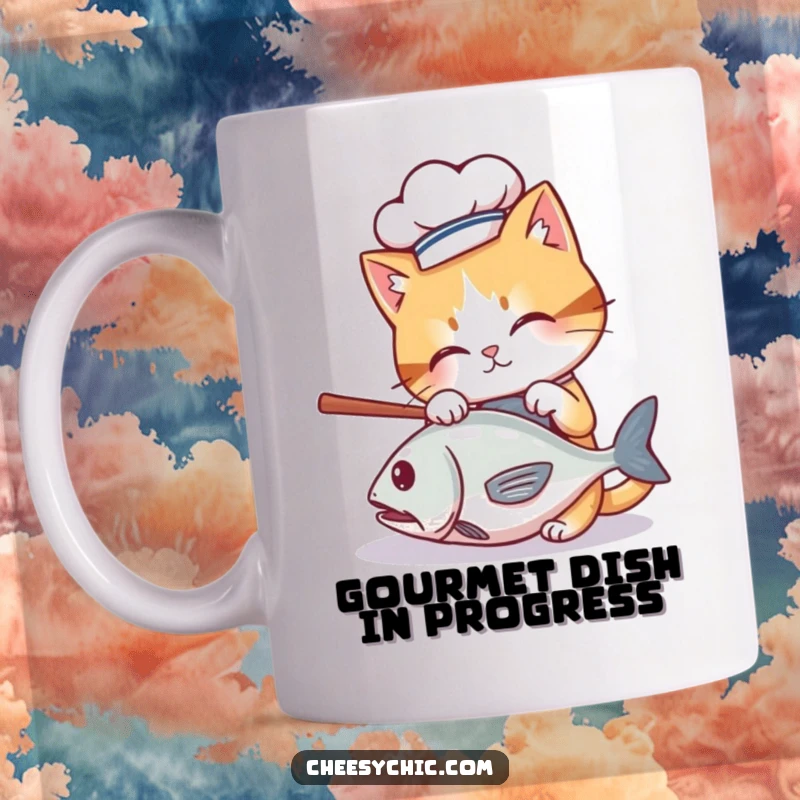 Funny mug featuring a cute cat wearing a tiny chef hat, batting playfully at a rolling fish, culinary humor.