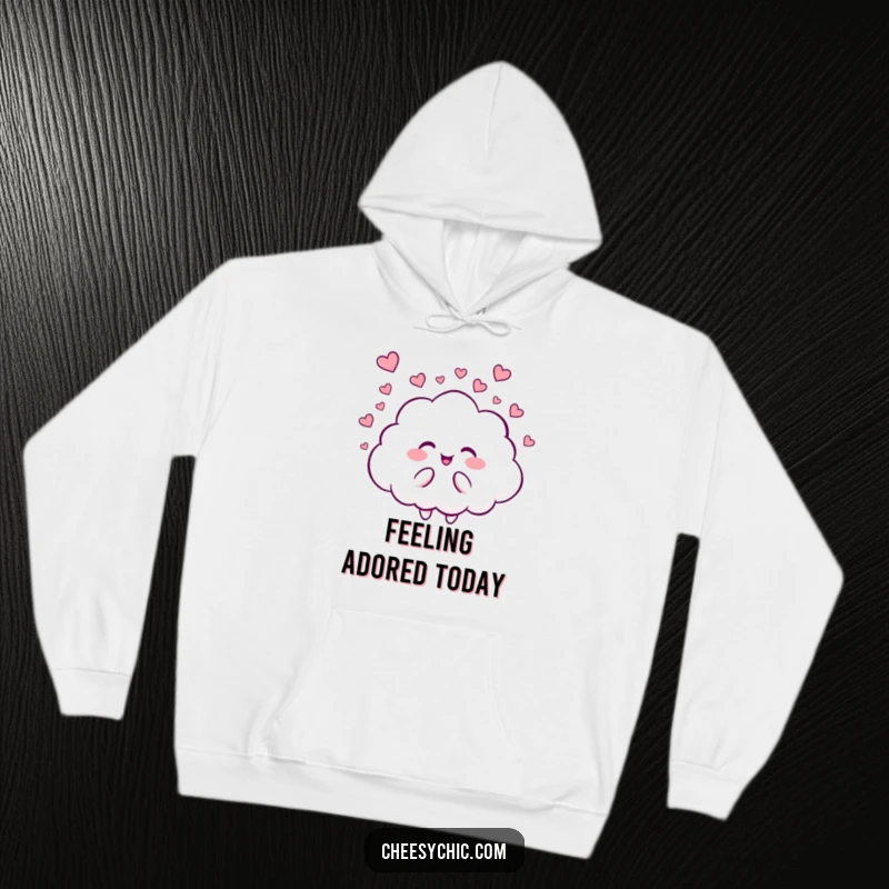 Funny hoodie showing a chuckling cloud character showering the world with a gentle cascade of tiny, romantic hearts. Pure affection.