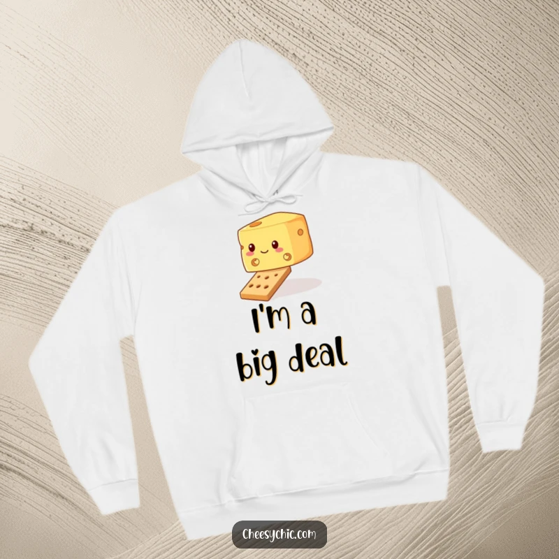 Funny hoodie showing a wobbly block of cheese trying to balance on a tiny cracker, embodying precarious situations with humor.