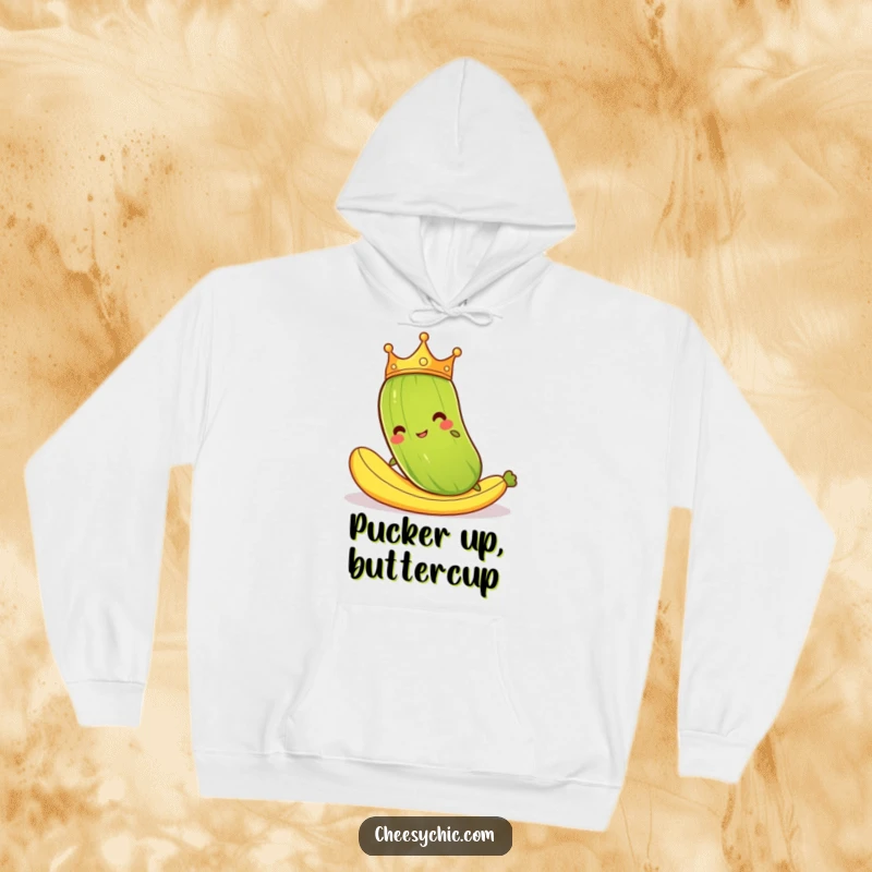 Funny hoodie showcasing a cartoon pickle in a crown hilariously slipping on a banana peel, perfect for casual, humorous wear.