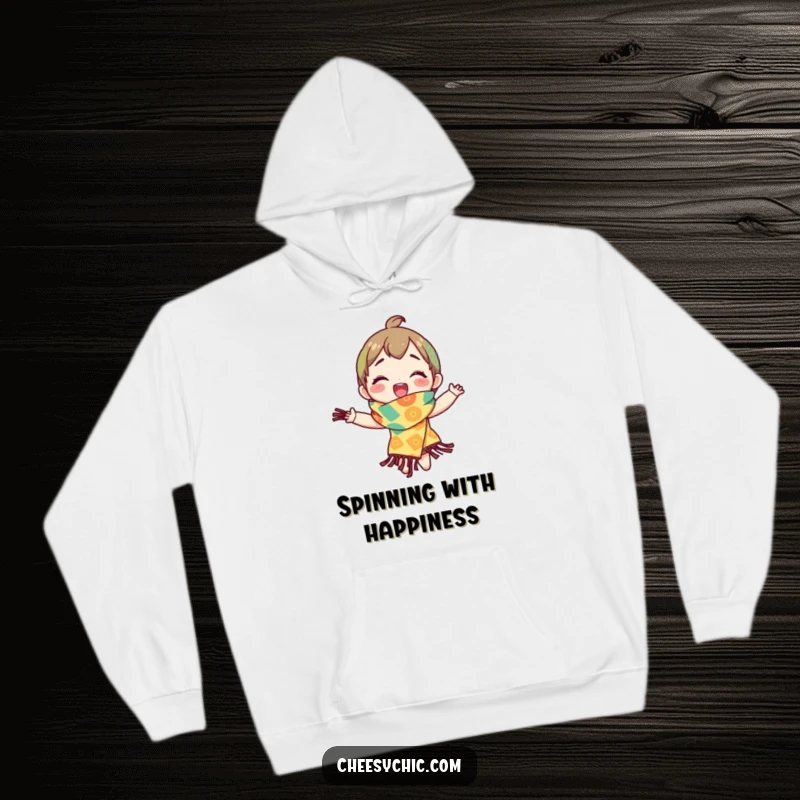 Funny hoodie featuring a character spinning with delight in a vibrant, patterned scarf, offering cozy and cheerful vibes.