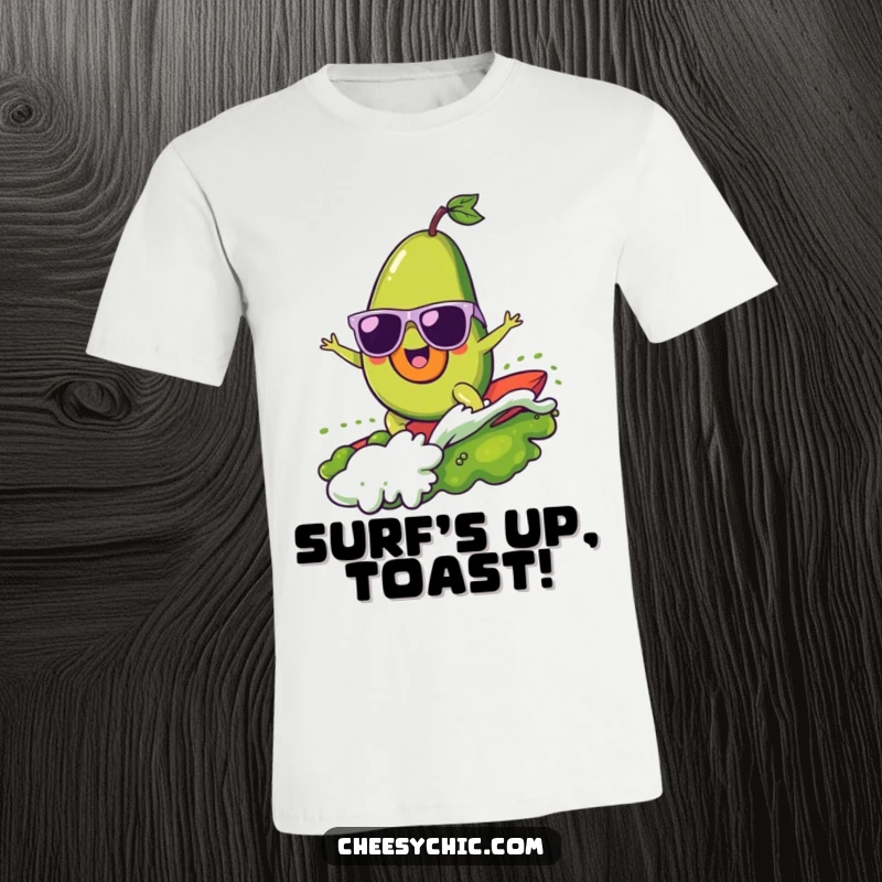 Funny t-shirt featuring a cheerful avocado wearing tiny sunglasses, expertly surfing a wave of guacamole, looking rad and carefree.